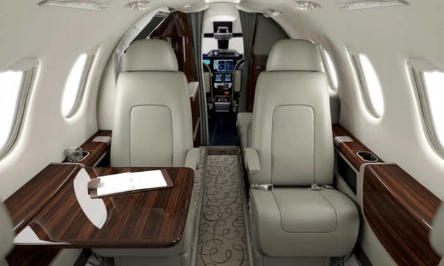 Embraer Phenom 300 N324GV photo 3