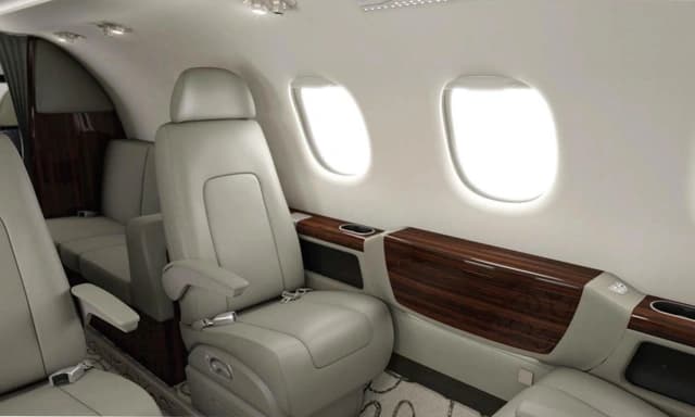 Embraer Phenom 300 N324GV photo 2