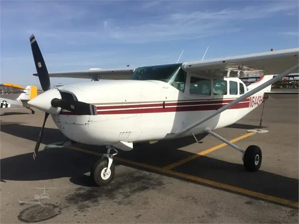 Cessna 207 N6449H operated by Plane Travel, Inc., exterior