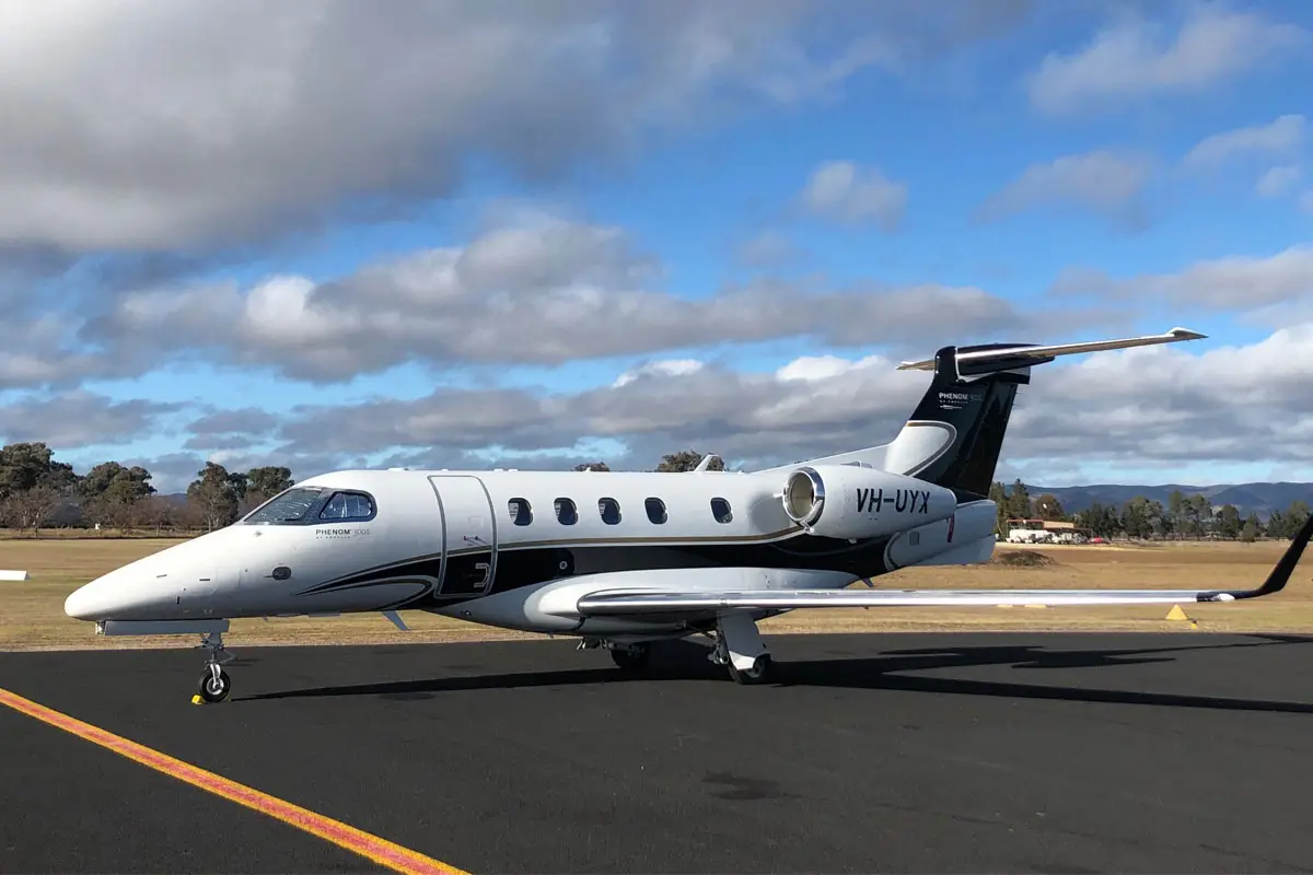 Embraer Phenom 300 VH-UYX operated by Flight Options Australia Pty Ltd, exterior